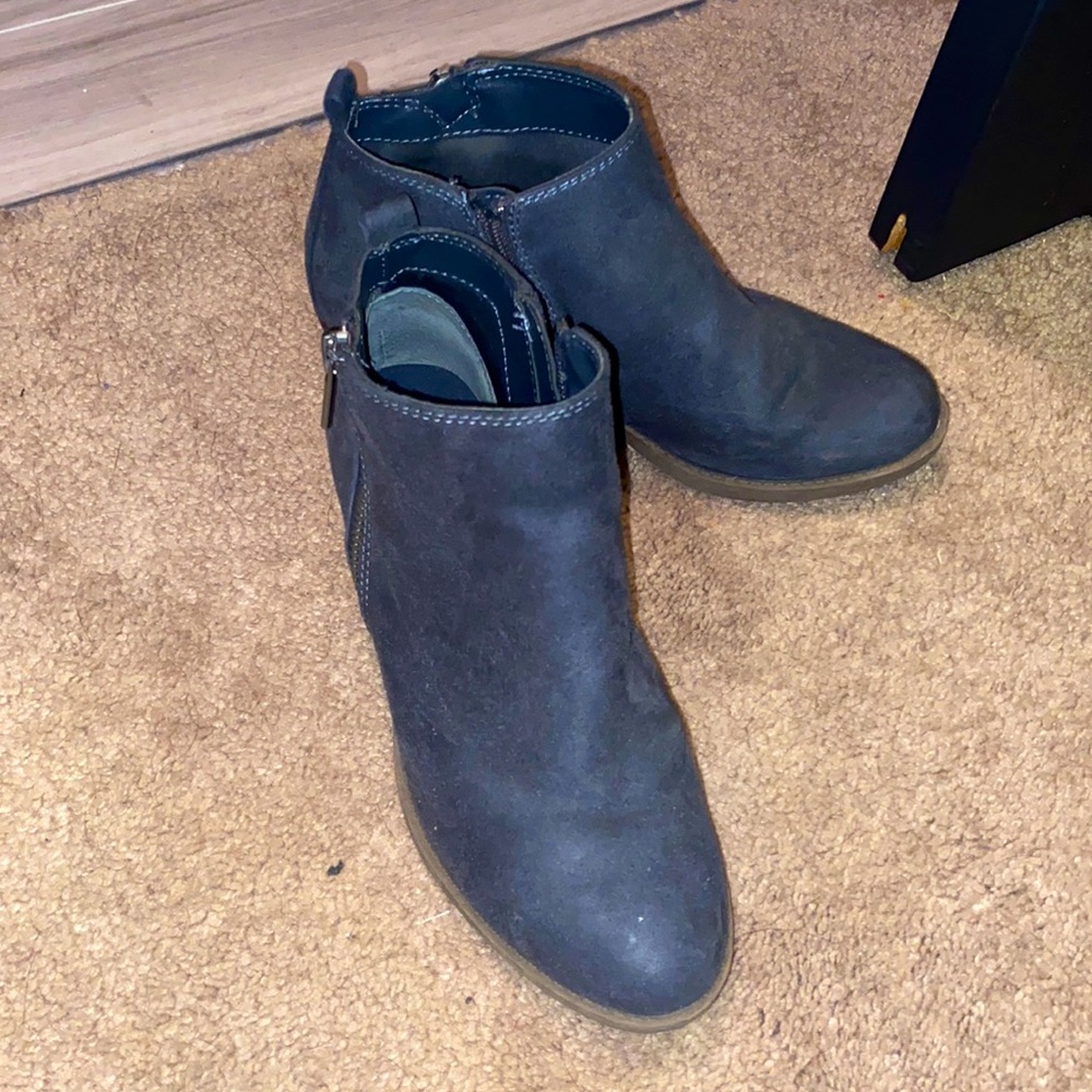 Ankle zip booties. Dark navy blue color with brown heel.
